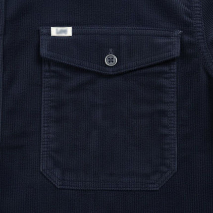 قميص رجالى قطيفه مضلع ساده بجيوب امامية لون كحلي